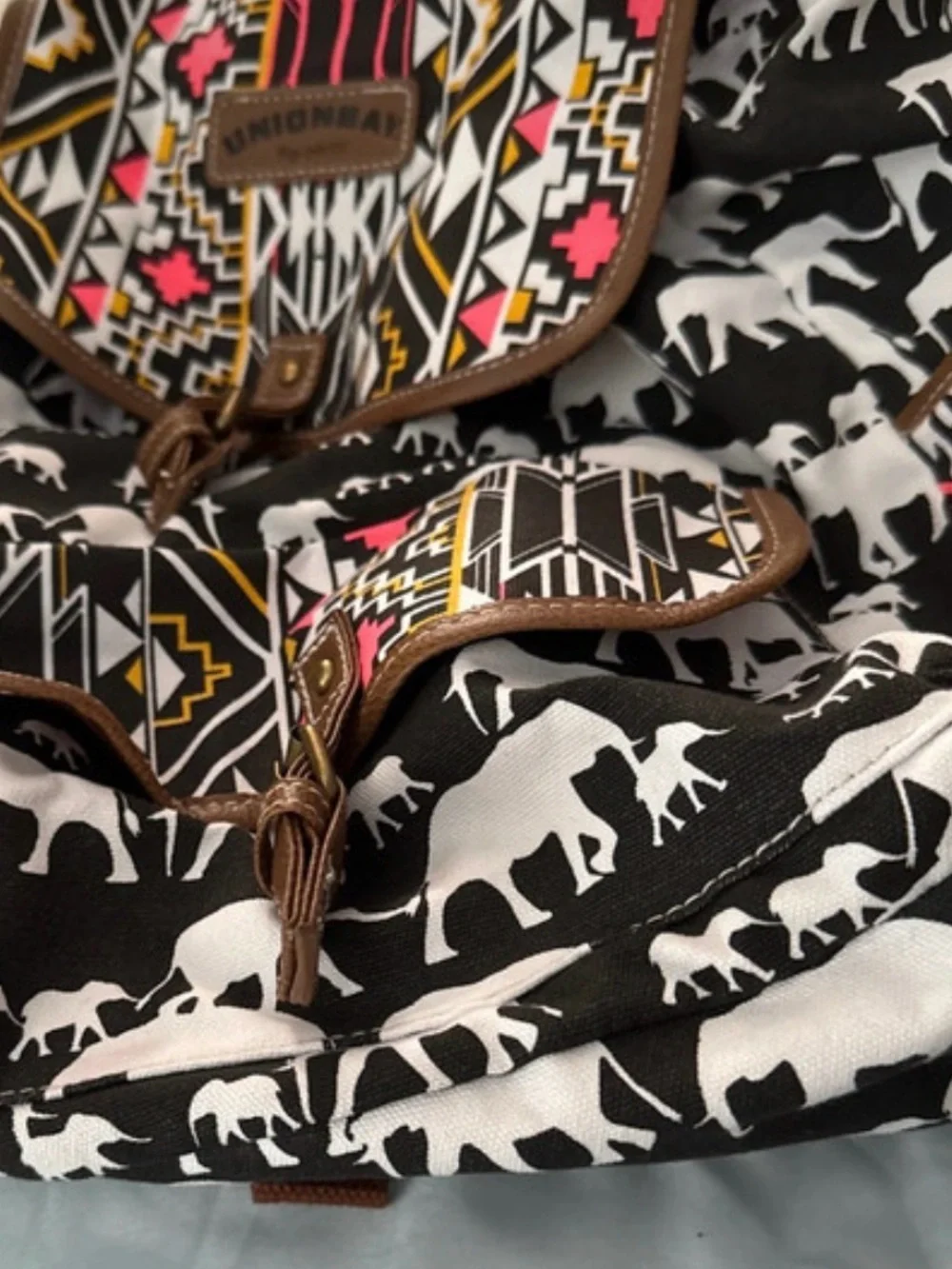 UNIONBAY Black & White Elephant Pattern Backpack with Pink and Yellow Accents